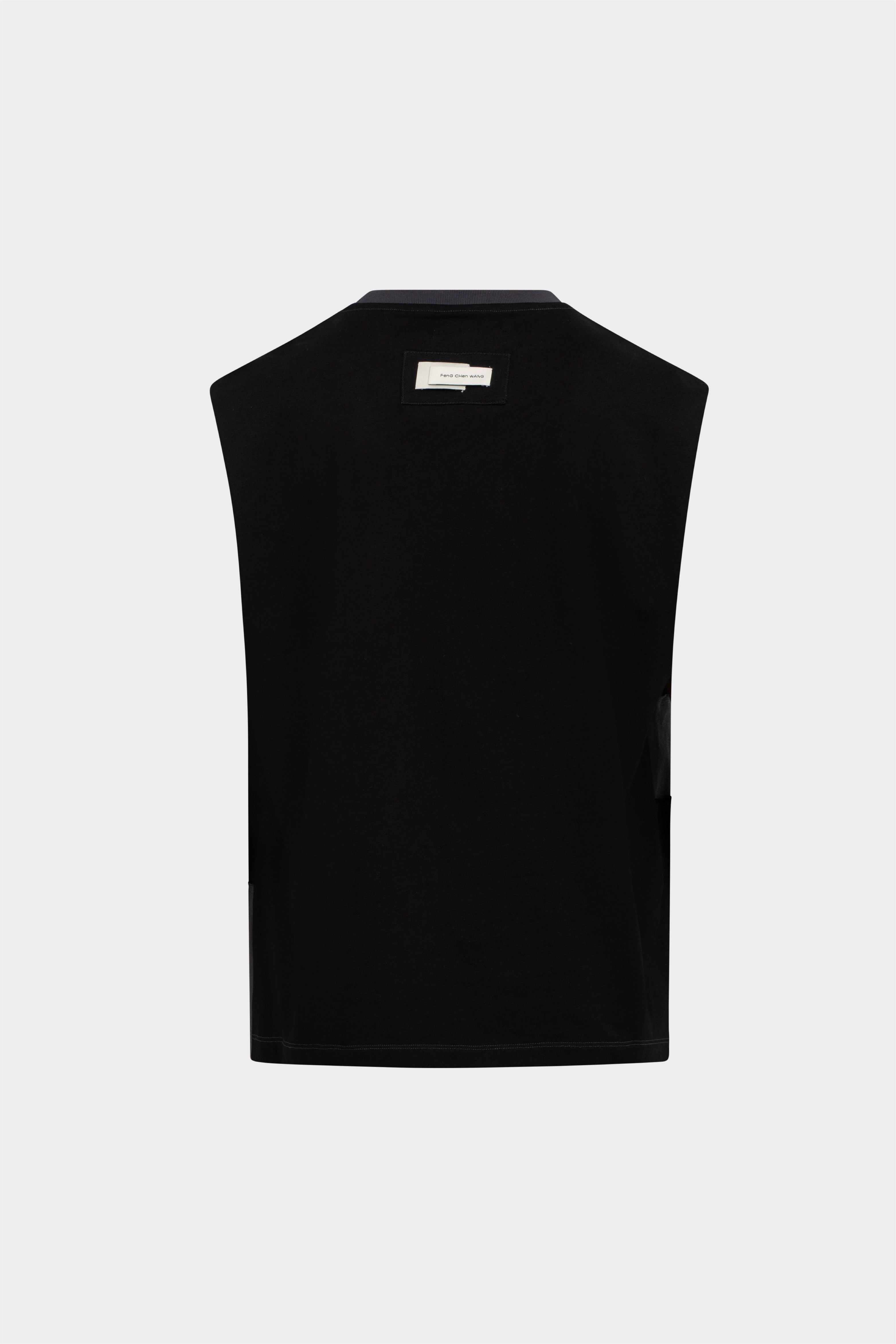 Selectshop FRAME - FENG CHEN WANG Deconstructed Patch Vest Outerwear Concept Store Dubai