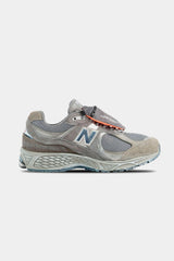 Selectshop FRAME - NEW BALANCE 2002R Grey Brown With Pouch Footwear Concept Store Dubai